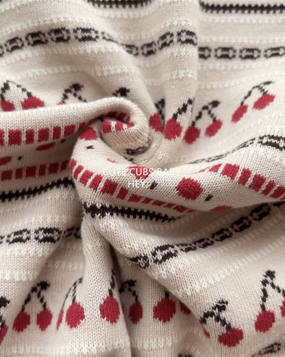 チェリー柄ニットベビージャンプスーツ