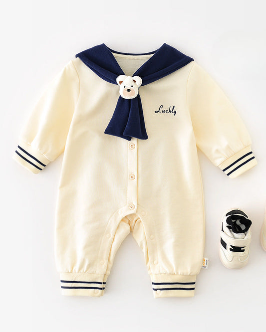 Baby jumpsuit with navy collar and bear detail