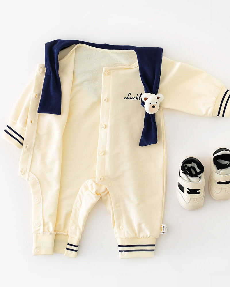 Baby jumpsuit with navy collar and bear detail