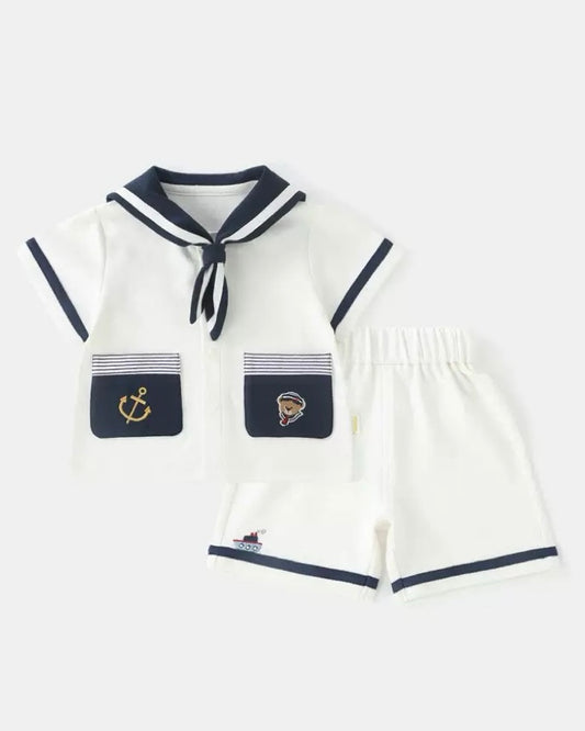 Short sleeve baby jumpsuit set with navy collar and pocket detail
