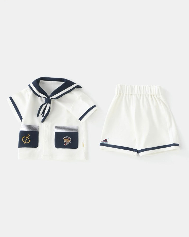 Short sleeve baby jumpsuit set with navy collar and pocket detail