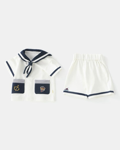 Short sleeve baby jumpsuit set with navy collar and pocket detail